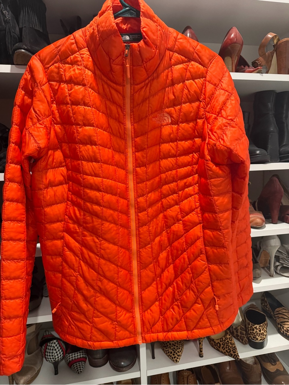 The North Face Women's Bright Orange Quilted Puffer Jacket